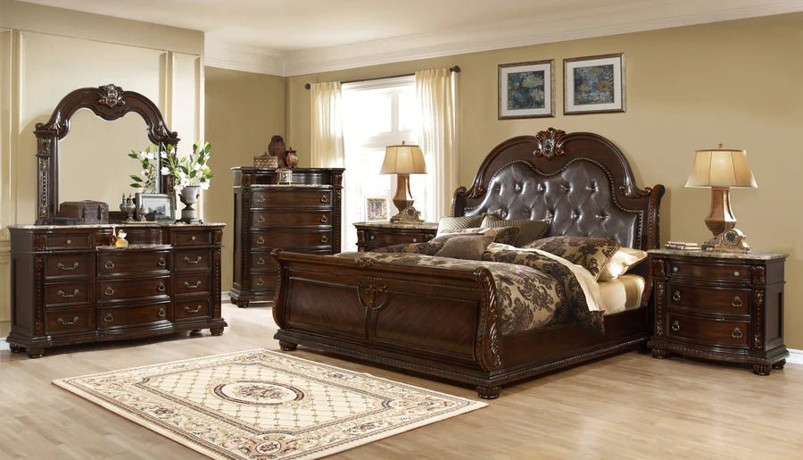 McFerran B9500 sleigh bed with tufted bonded leather headboard, carved crest, and matching bedroom set